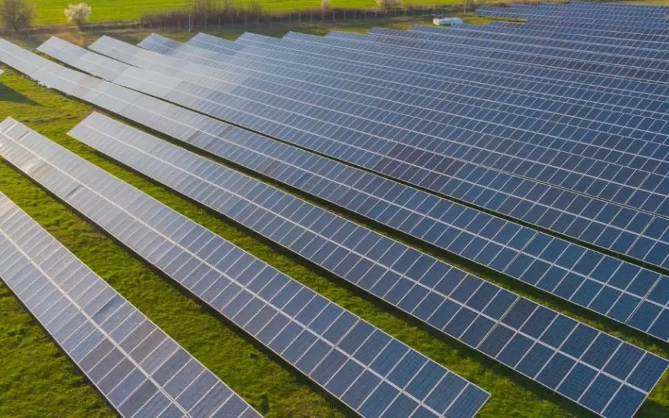 Rows of solar panels in a field